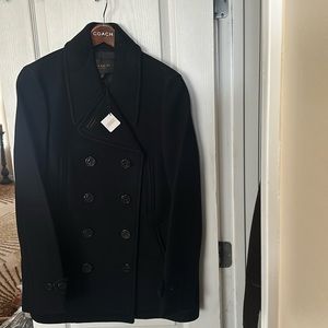 Brand new Coach Pea Coat. Never worn and clean. It’s been in the closet
